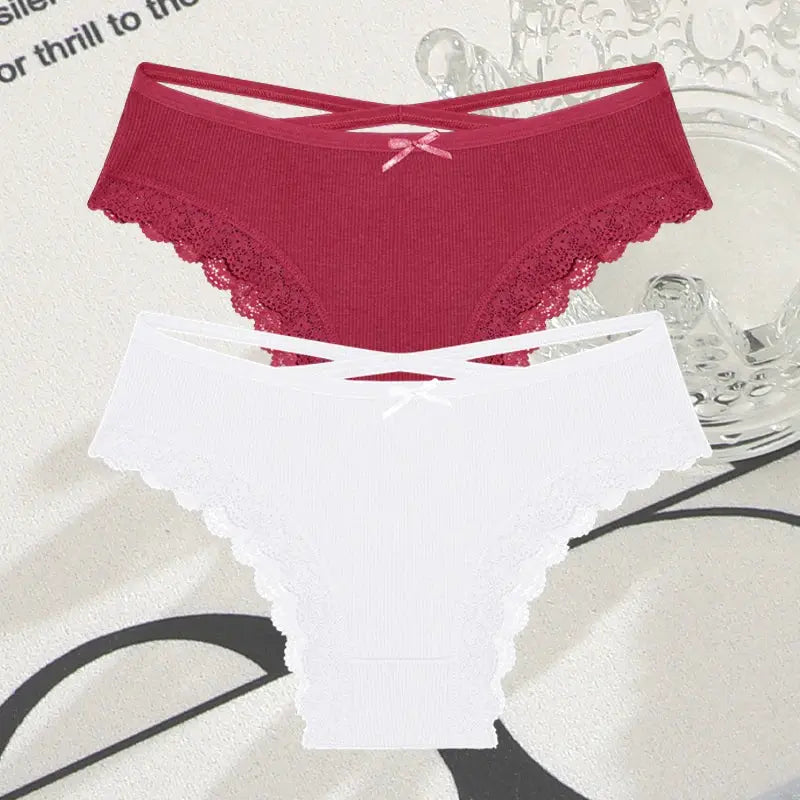 2-pack cotton panties with lace trim and crisscross waistband; burgundy and white low-waist Brazilian briefs.