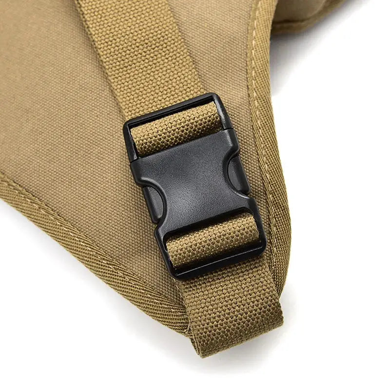 Men's canvas drop waist bag by Simples Market with tan strap and black buckle