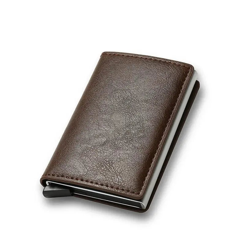 Brown leather minimalist RFID card wallet with slim profile and metal clip
