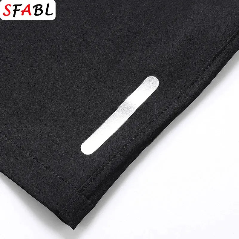 Men's black quick-dry jogging shorts by Simples Market with a white reflective stripe; SFABL logo visible.