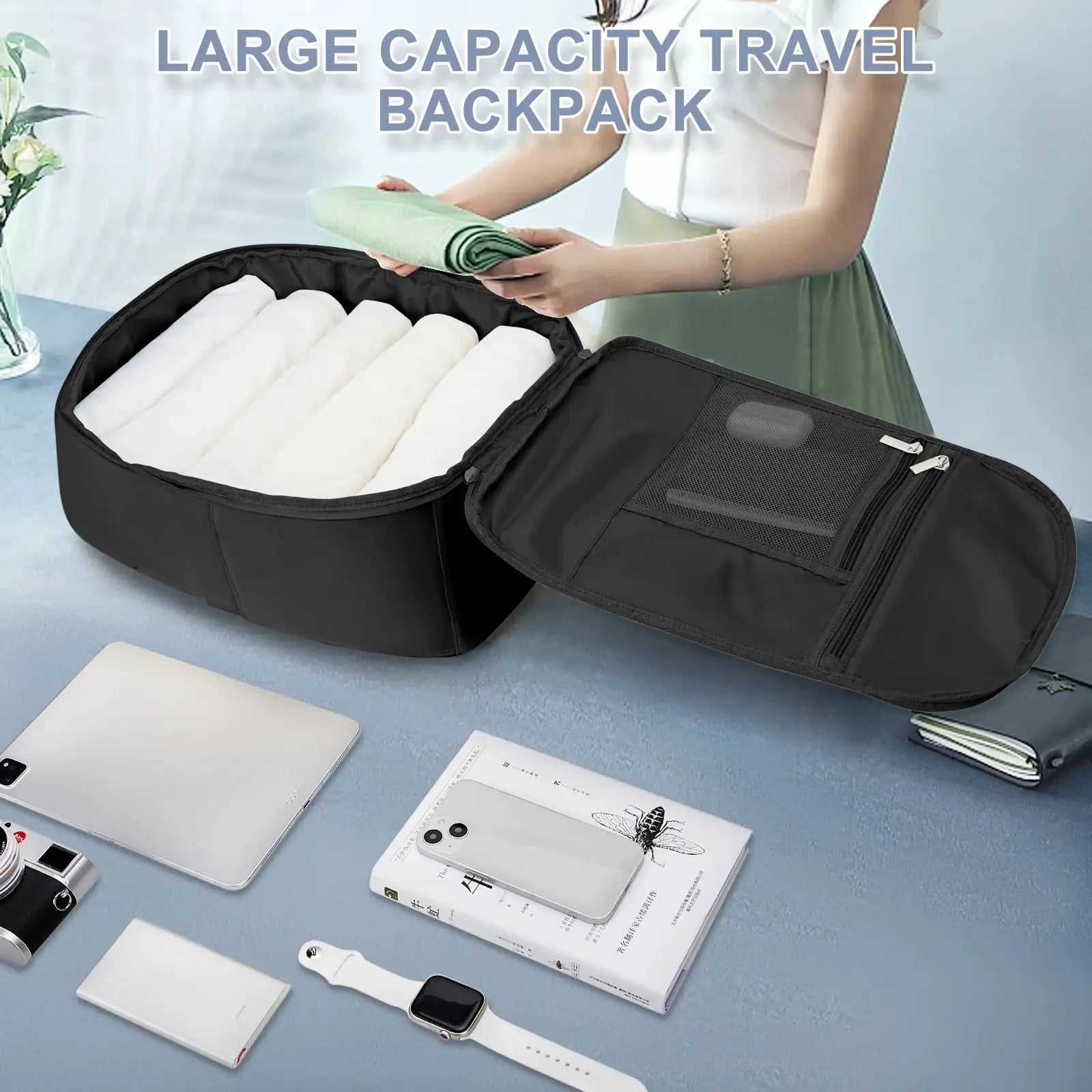 Black large-capacity travel backpack cabin bag with open main compartment showing folded white clothes