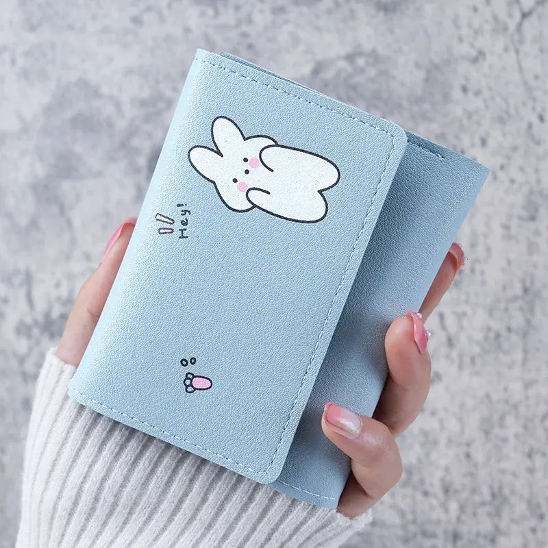 Wallet by Simples Market: small light-blue cartoon bunny design with card holder