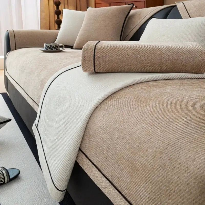 Heavy Non-Slip Sofa Protector Classic by Simples Market in beige chenille with decorative stitching.