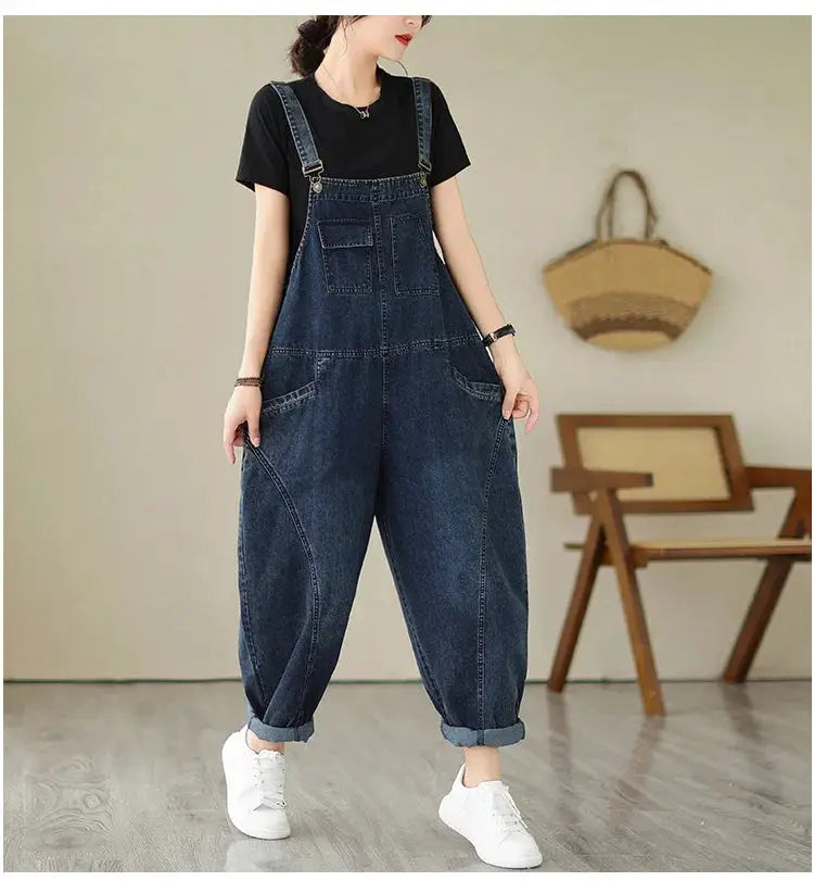 Blue denim overalls with multiple pockets and suspenders, rolled cuffs, casual loose fit
