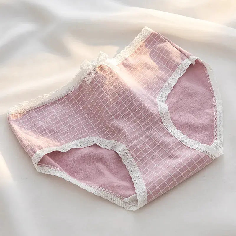 Women's pink cotton panties with white lace trim and grid pattern