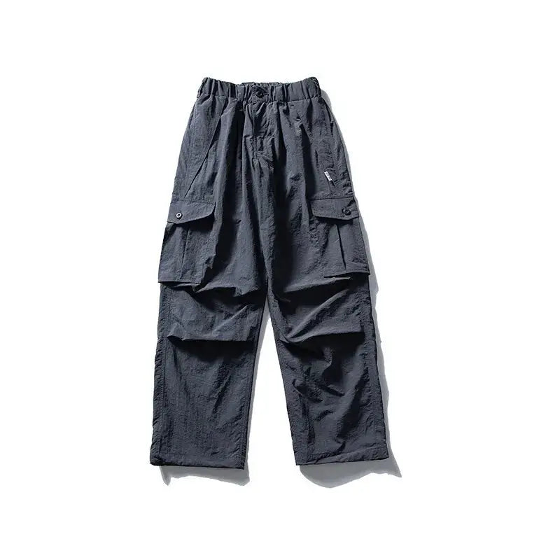 Ultra-loose outdoor cargo pants with wide legs and large side pockets in black