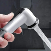 Handheld toilet bidet faucet by Simples Market; adjustable ABS spray nozzle, white-silver finish