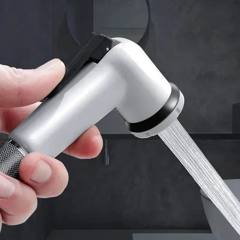 Handheld toilet bidet faucet by Simples Market; adjustable ABS spray nozzle, white-silver finish