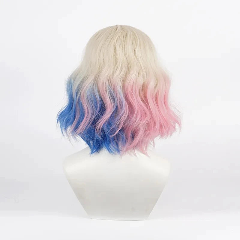 Enid Sinclair cosplay wig, short wavy bob with blonde roots fading to blue and pink ombre.