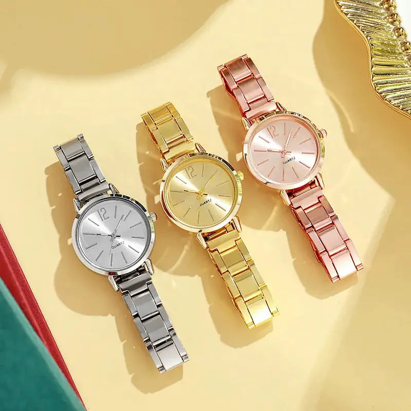 Simples Market three-piece women's quartz watch set with silver, gold, and rose-gold metal bracelets.