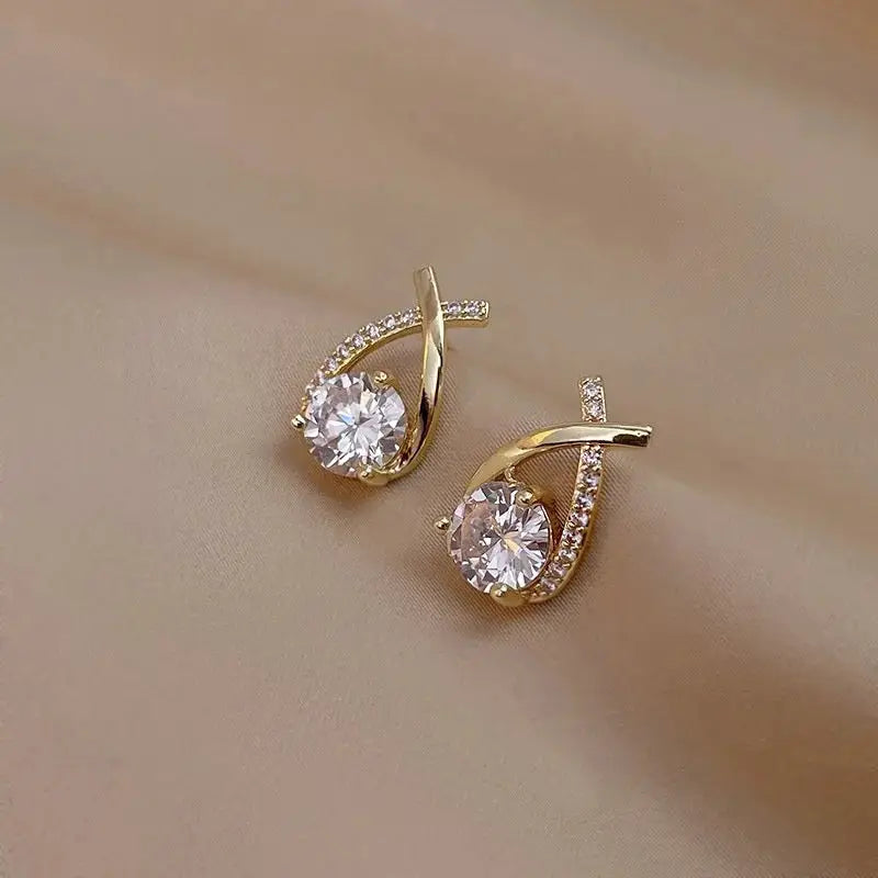 Simples Market SKEDS gold-tone cross stud earrings with crystal-studded teardrop design (pair)