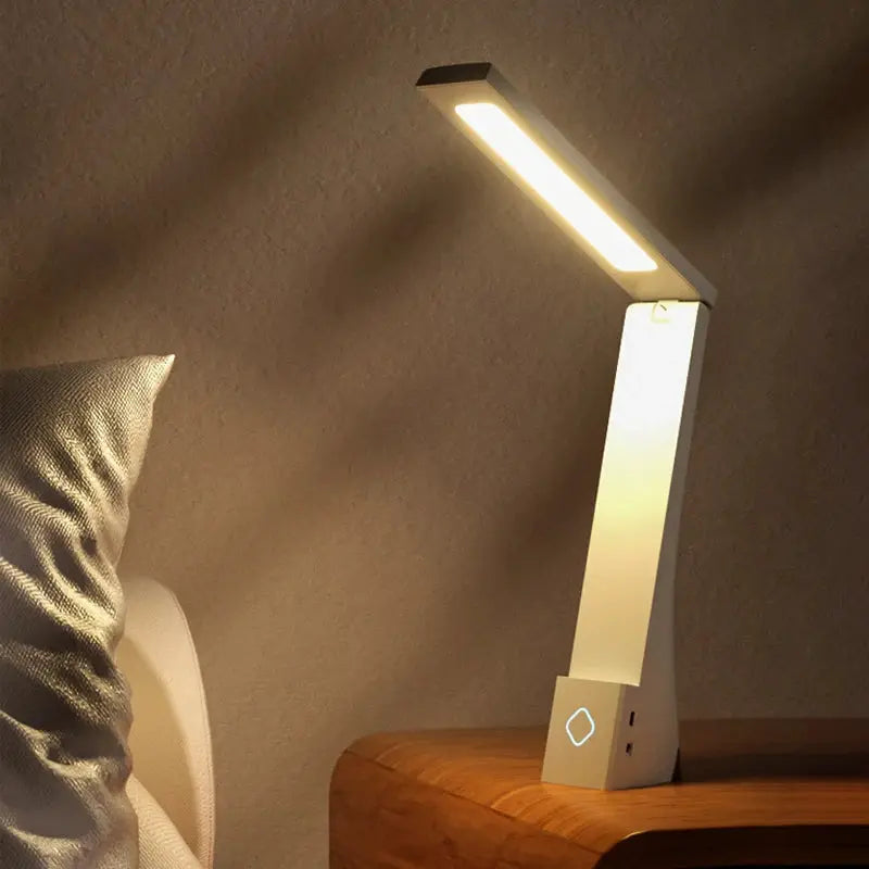 LED desk lamp, white foldable table light with USB charging, eye-protecting LED panel on nightstand Simples Market