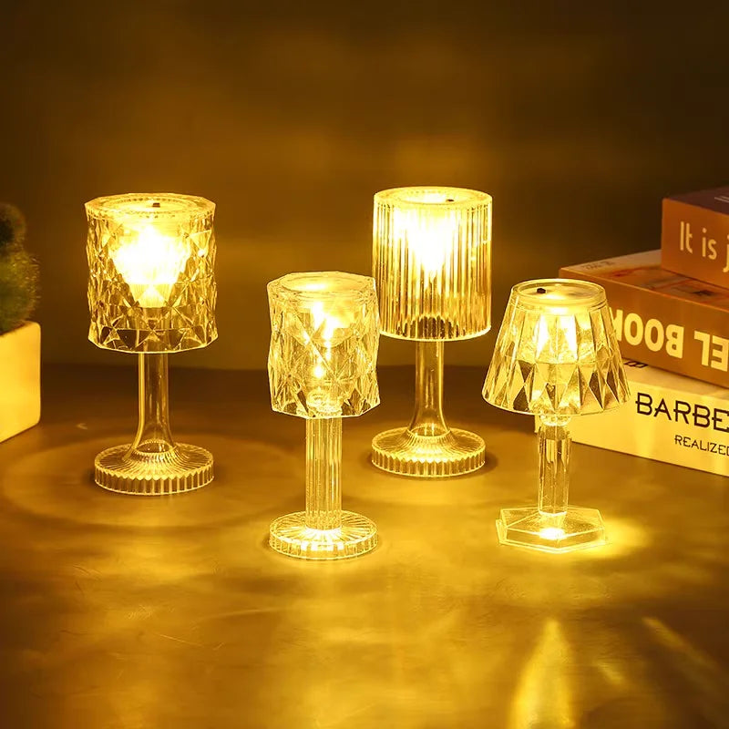 Simples Market four-piece crystal table lamp set, battery-powered clear faceted lamps with warm amber LED glow.