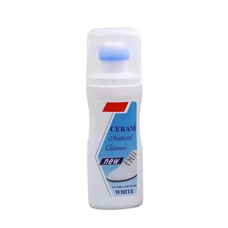 White shoe cleaner bottle with built-in blue brush applicator and blue label