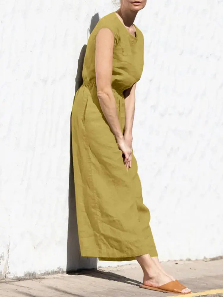 Women's jumpsuit in mustard cotton and linen, sleeveless with pockets, high-waist and wide-leg.
