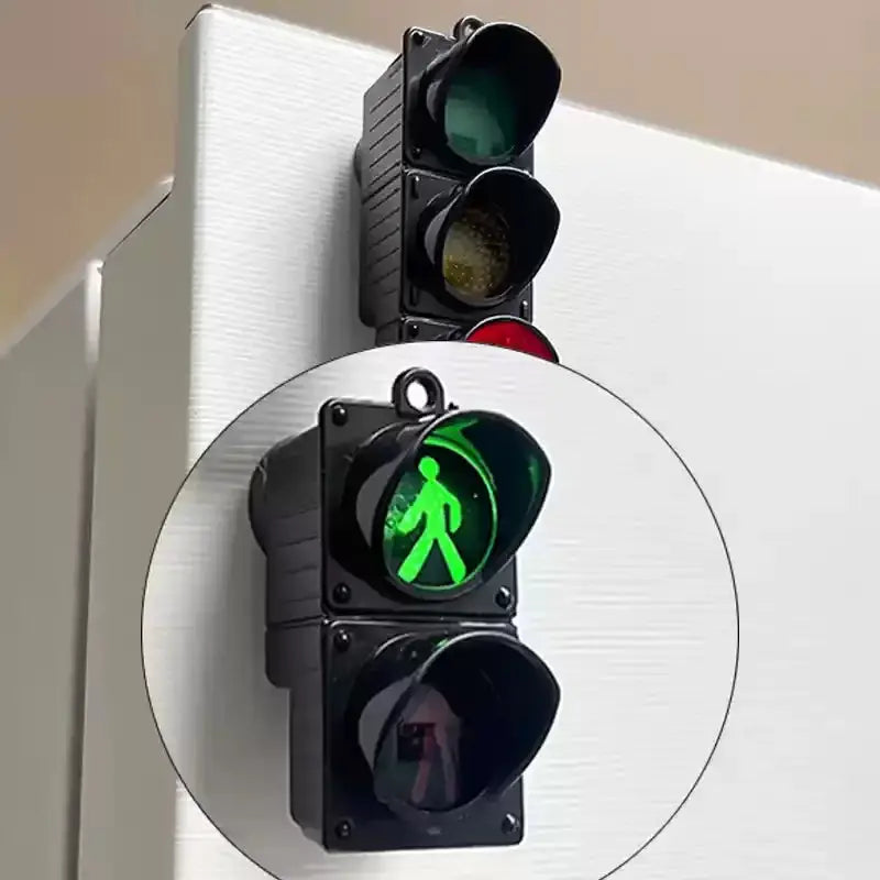 Traffic light magnetic refrigerator sticker by Simples Market; black plastic housing with green pedestrian signal