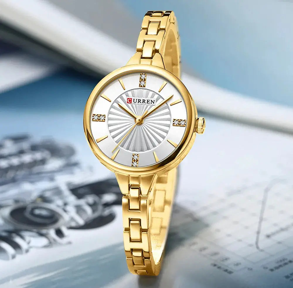 CURREN women's quartz watch with gold-tone stainless steel bracelet and silver dial with crystal markers