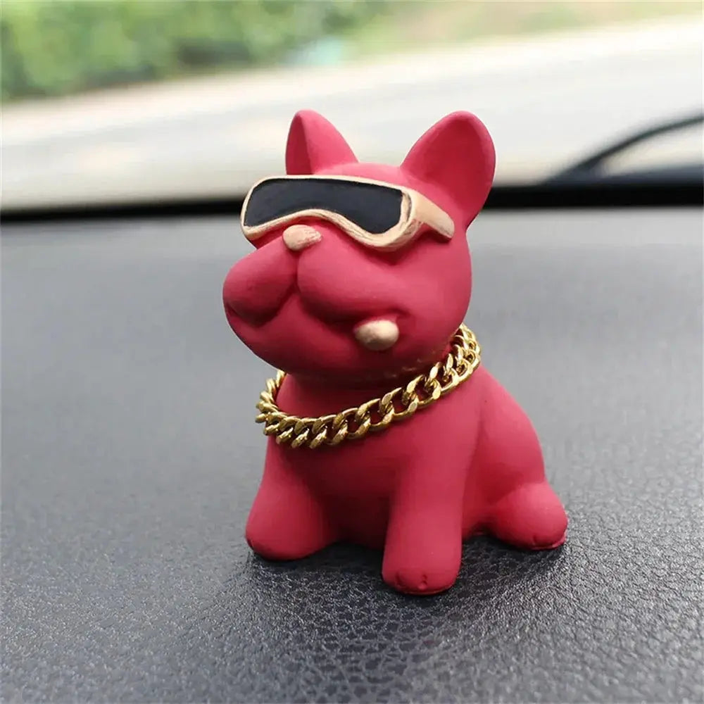 Bulldog resin car ornament by Simples Market; pink dashboard statue with sunglasses and gold chain.