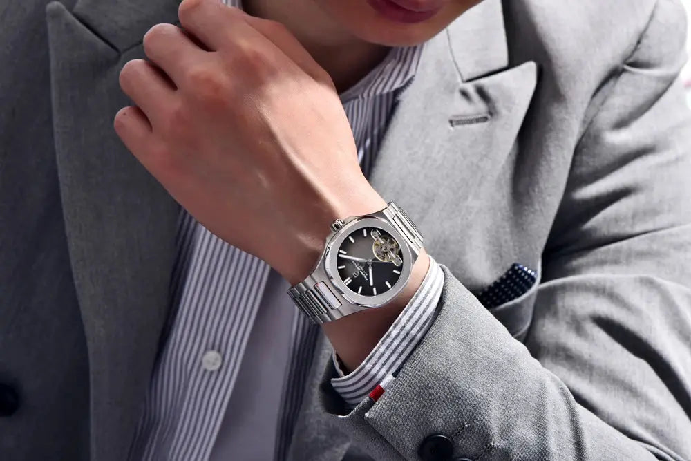 PAGANI DESIGN 2026 men's skeleton dial automatic stainless steel watch on a metal bracelet