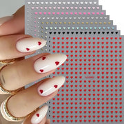 8pc 3D heart nail sticker set by Simples Market; red/pink mixed colors, self-adhesive decals for manicure.