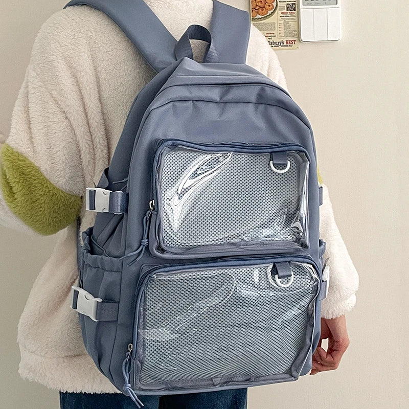 Blue Japanese-style transparent ita bag backpack with two clear mesh pockets and large capacity