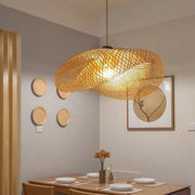 Bamboo woven LED pendant light, handmade vintage-style chandelier over dining table in living room