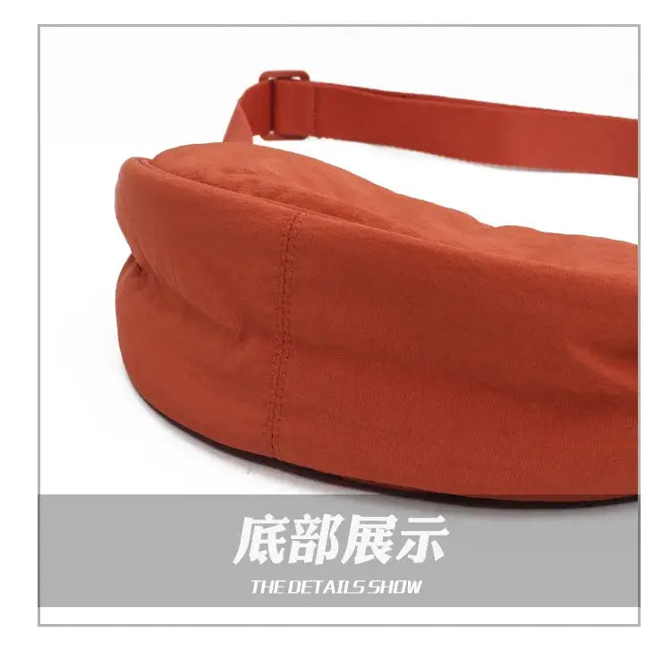Casual nylon hobo crossbody bag for women in orange with a wide strap and large capacity