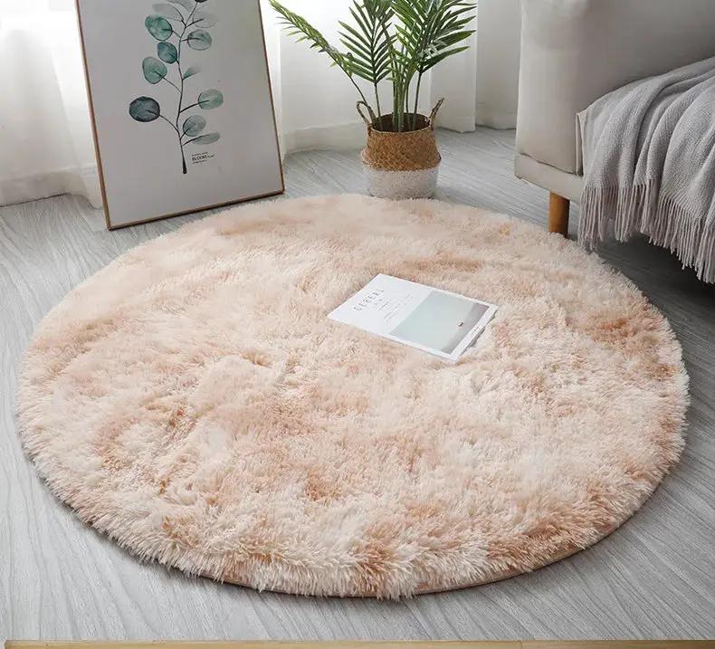 Round plush rug by Simples Market; soft peach fluffy floor mat for living room or bedroom decor.