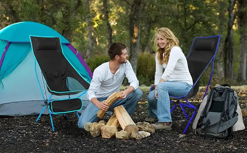 Ultralight folding chairs by Simples Market; blue-frame black seats, 2 chairs at a campsite.