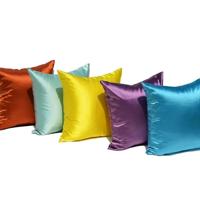 Six colorful satin pillow covers in orange, mint, yellow, purple and blue for sofa decor