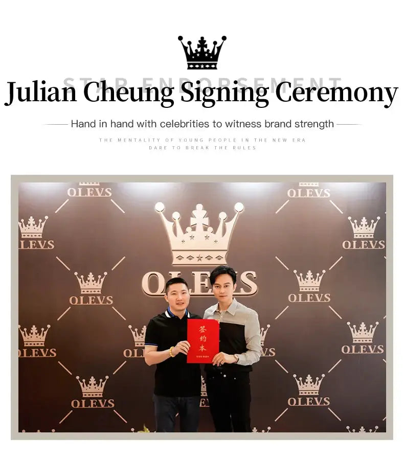 OLEVS branded signing ceremony backdrop with two men posing; one holds a red booklet.
