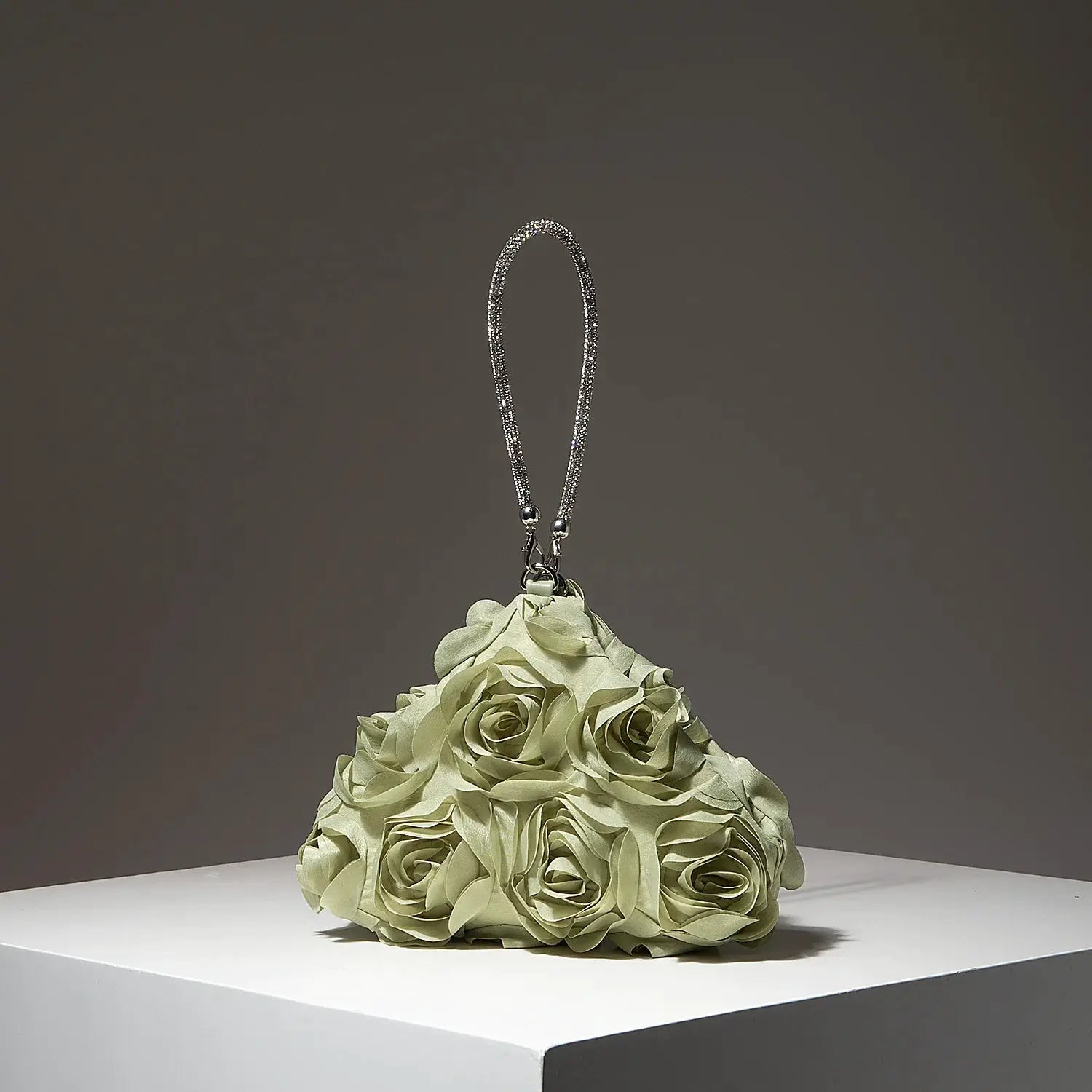 Mini purse with ivory satin rose bouquet and a silver rhinestone strap