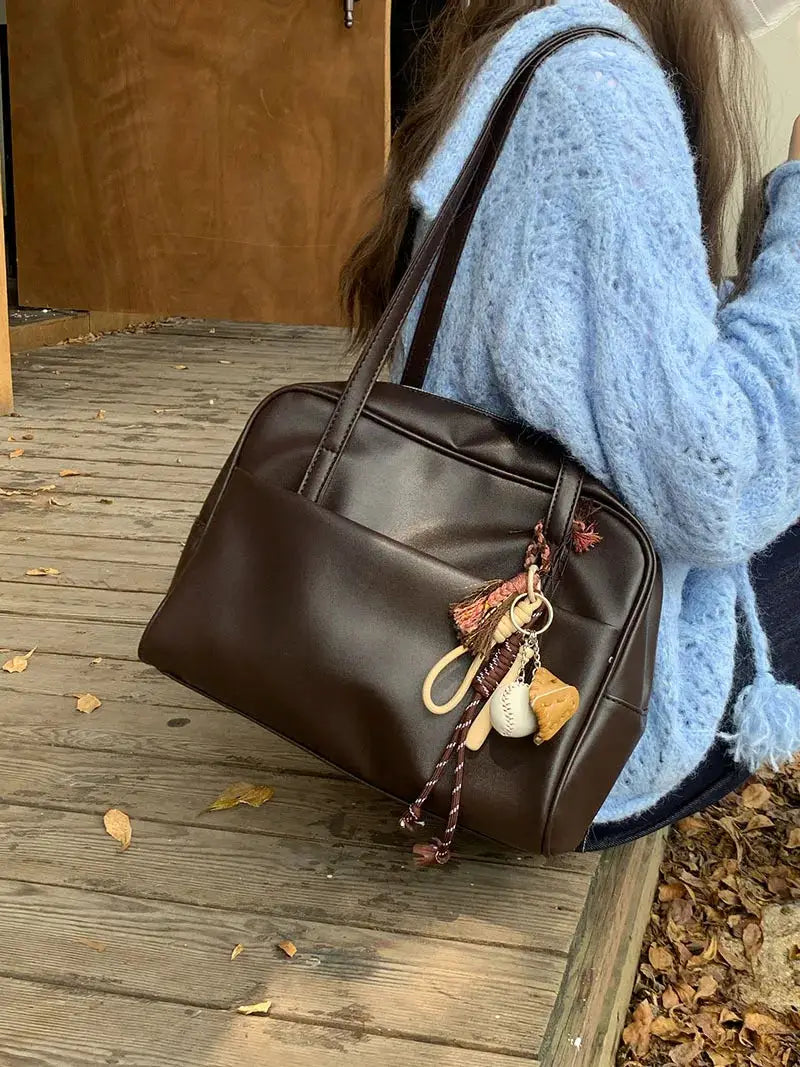 Korean style large-capacity brown leather shoulder tote bag with tassel charm