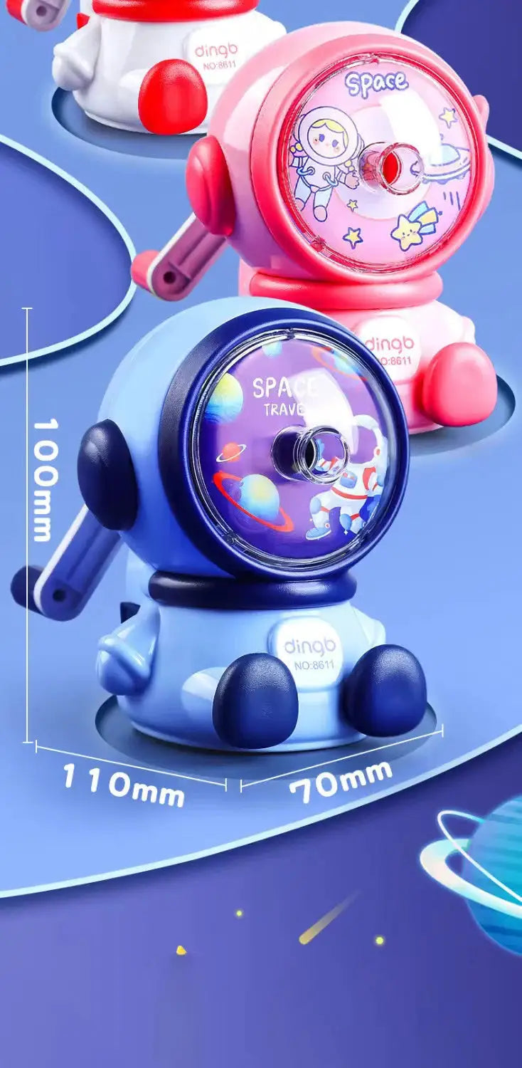 Two astronaut cartoon pencil sharpeners, pink and blue, hand-crank, space-themed with dingo branding
