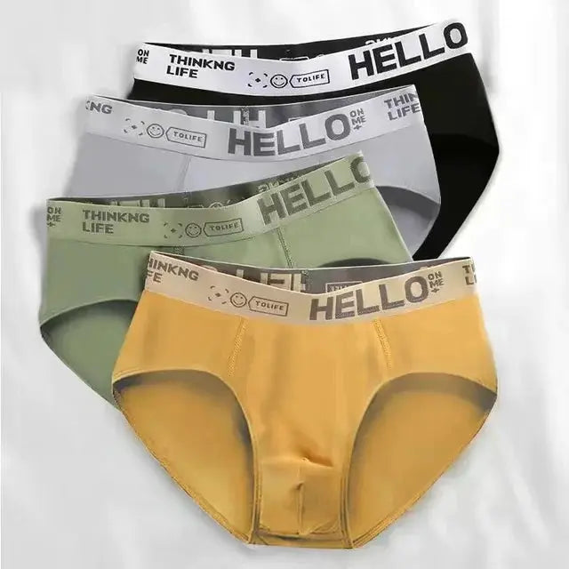 4-pack men's briefs by Simples Market in black, gray, green, and yellow with elastic waistband.
