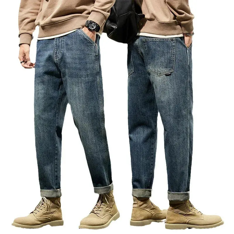Men's denim jeans, loose Harajuku-style straight fit, blue wash with rolled cuffs; two pairs shown
