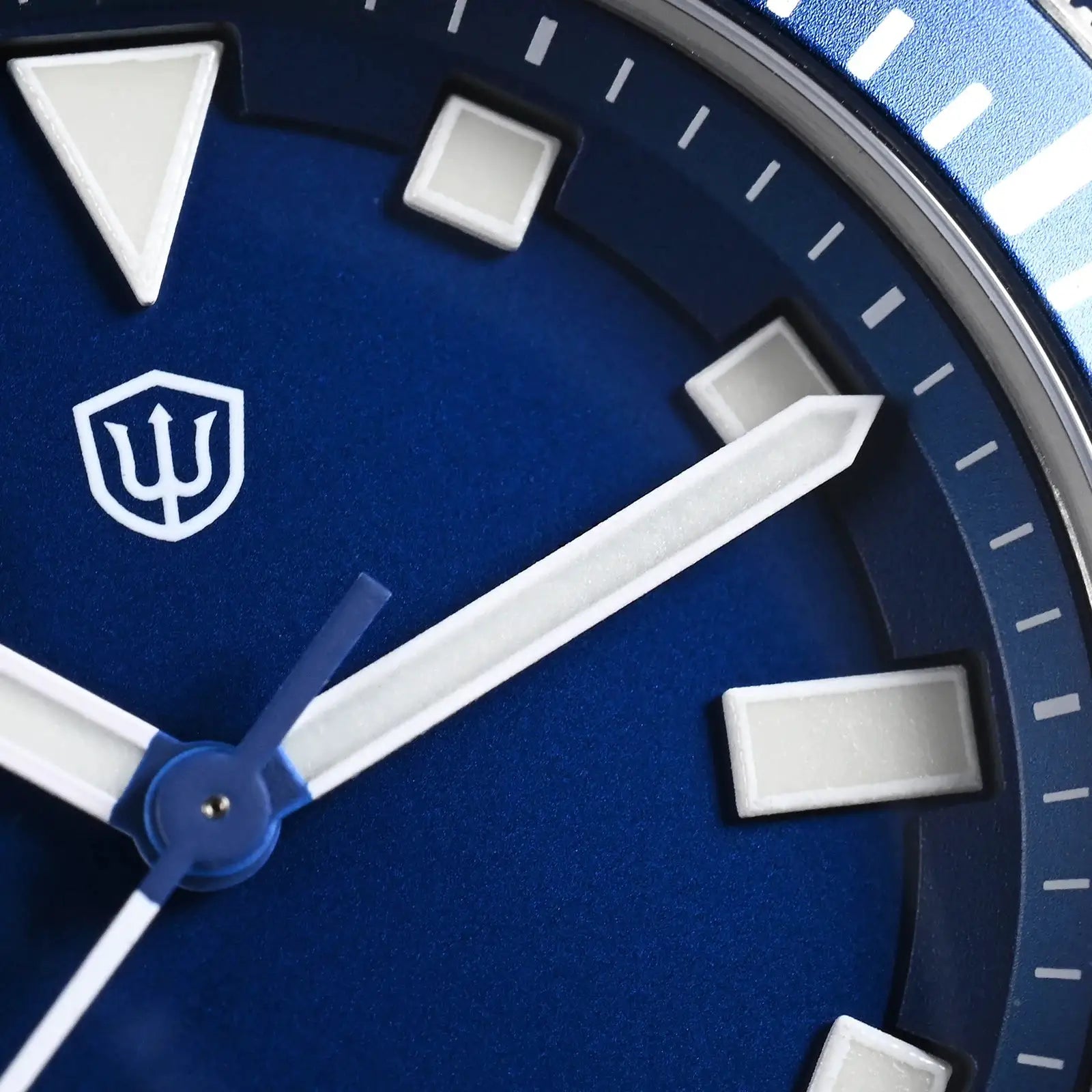 Watchdives WD1969 Pro blue dial watch with white luminous markers and hands; logo on dial.