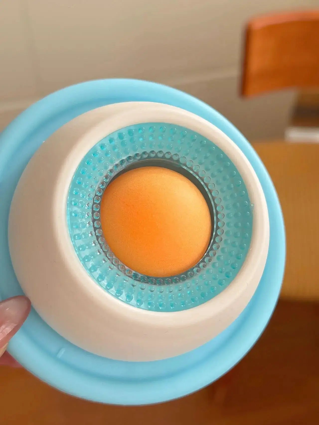 Simples Market blue interactive dog lick toy slow feeder with teal textured ring and orange ball in center