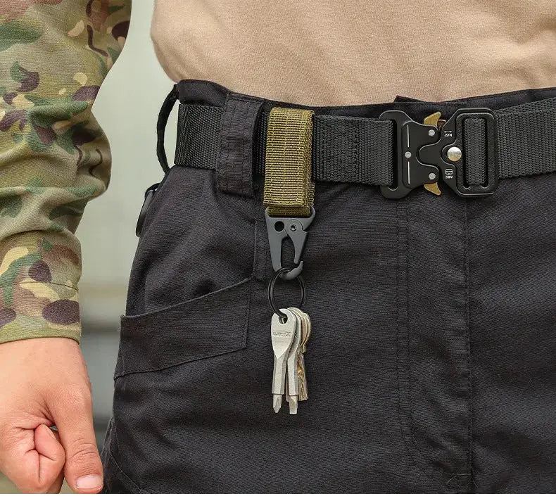 Carabiner high-strength nylon key hook clipped to a tactical belt with tan MOLLE strap; keys on ring