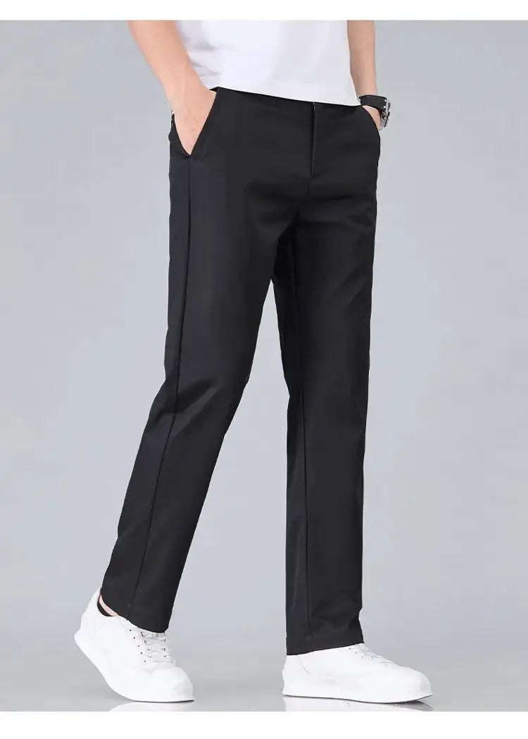 Men's black stretch-cotton slim-fit trousers with side pockets.