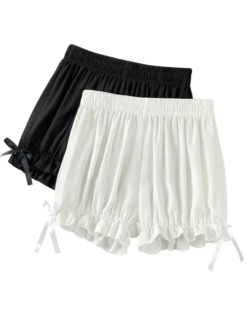 Two-piece women's lace short panty bloomers in black and white satin-like fabric with ruffled hems and side bows