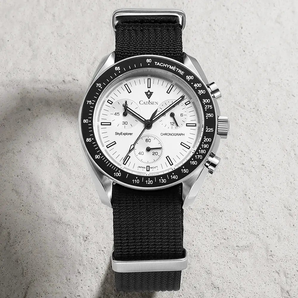 CADISEN men's chronograph watch with white dial, black tachymeter bezel, steel case, and black canvas strap