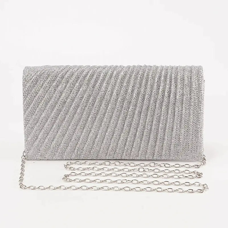 Evening clutch by Simples Market in silver glitter with chain strap