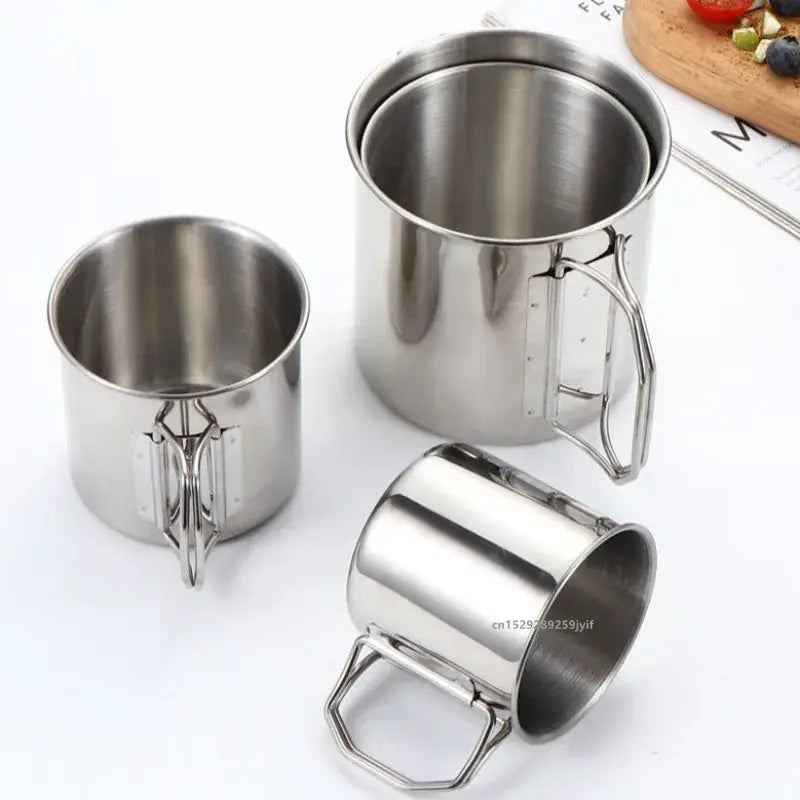 Stainless steel camping cup set with foldable handles; 3 cups in varying sizes