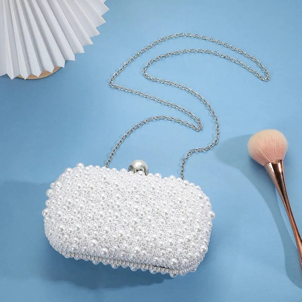 Handcrafted pearl evening bag with silver chain, white pearl beads for weddings