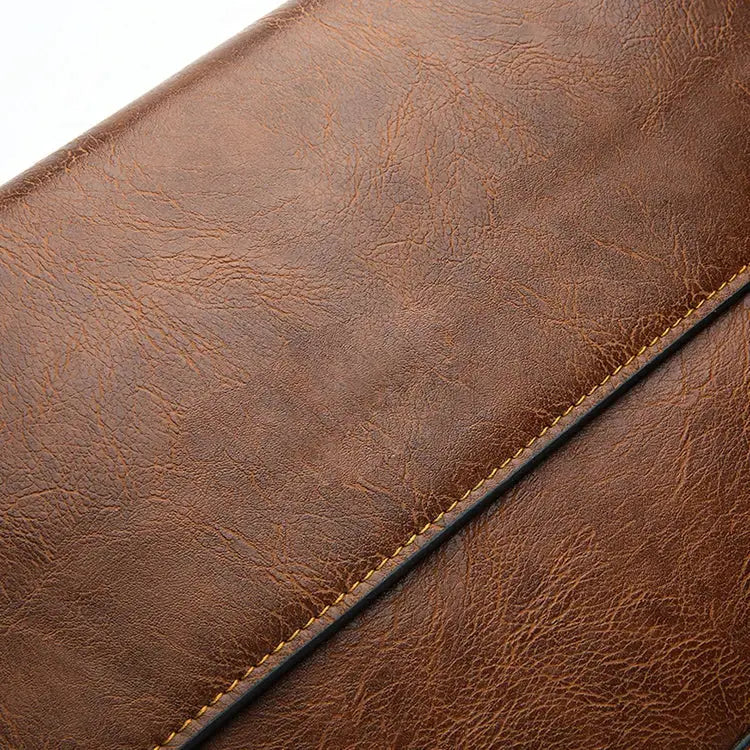 Shoulder bag for men, brown leather texture close-up detail
