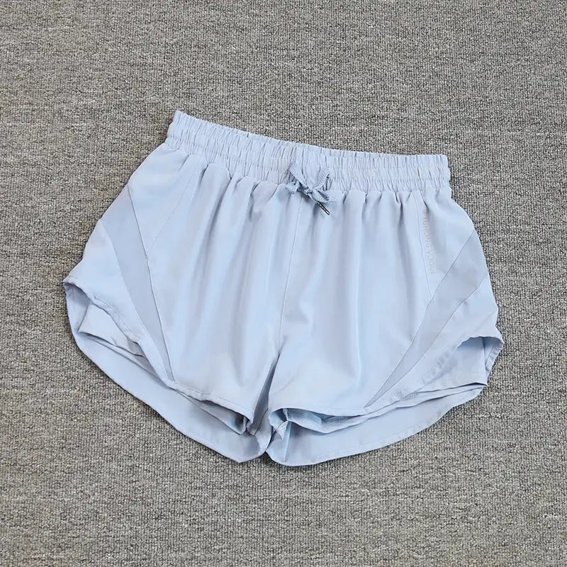 Women's light-blue breathable quick-drying running shorts with elastic waistband and drawstring