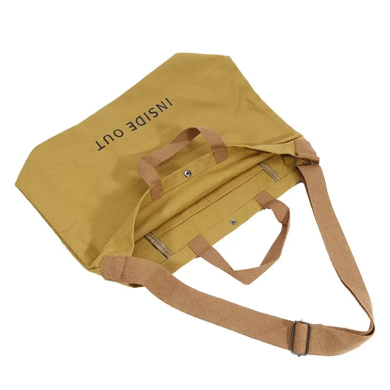 Canvas crossbody bag in camel color with unisex design and adjustable strap, large capacity