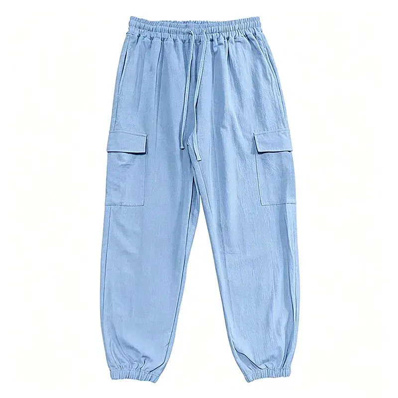Men's light blue cotton-linen cargo jogger pants with elastic waist, drawstring, and multiple pockets
