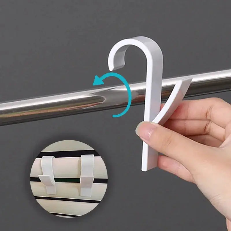 Clip-on bathroom towel holder for radiator rail in white by Simples Market; set of two hooks